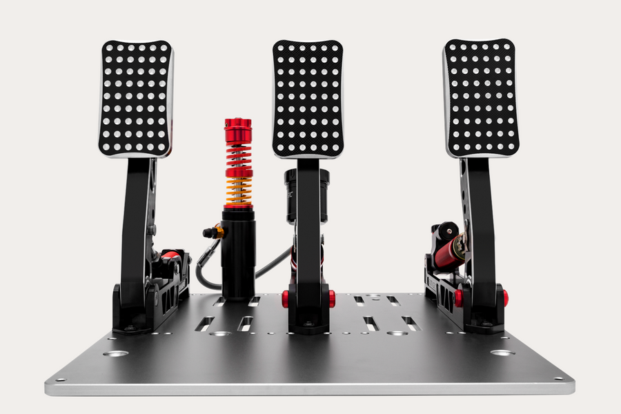 Original Simagic P2000 hydraulic pedals with their complete baseplate and hydraulic assembly.