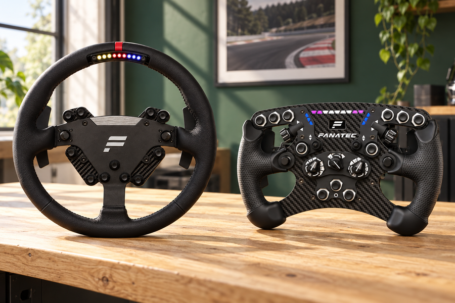 Round Fanatec ClubSport RS and formula-style steering wheels displayed side by side on an oak workbench.