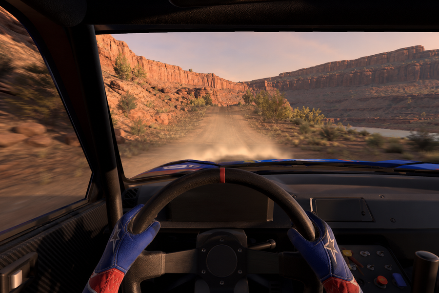 Driver's-eye sim racing wheel view on the NGRC Rally Utah 2026 gravel loop in a BeamNG.drive v0.39-style scene