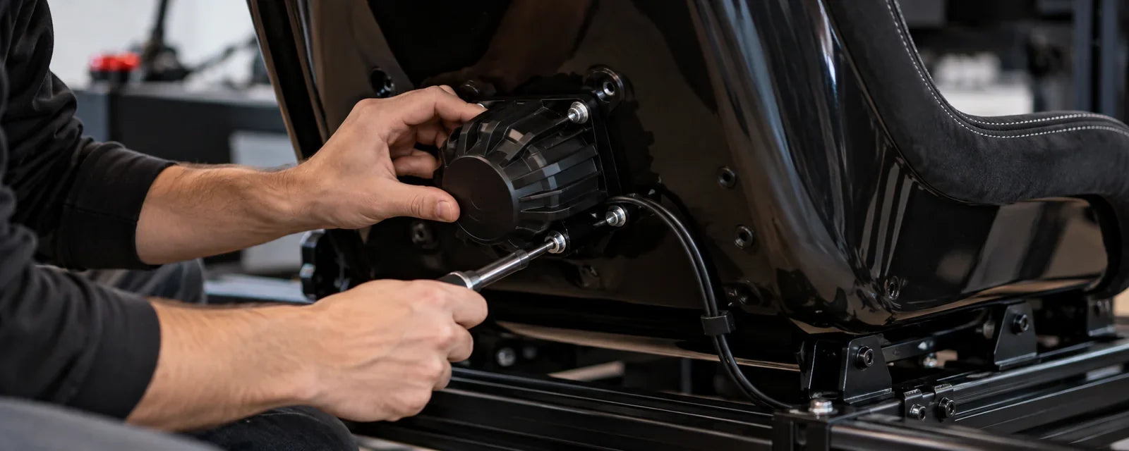 How do you mount a bass shaker on an Atlas seat?
