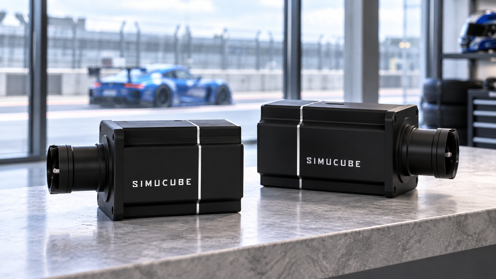 Simucube 2 Sport and Pro wheelbases displayed side by side in a motorsport showroom.
