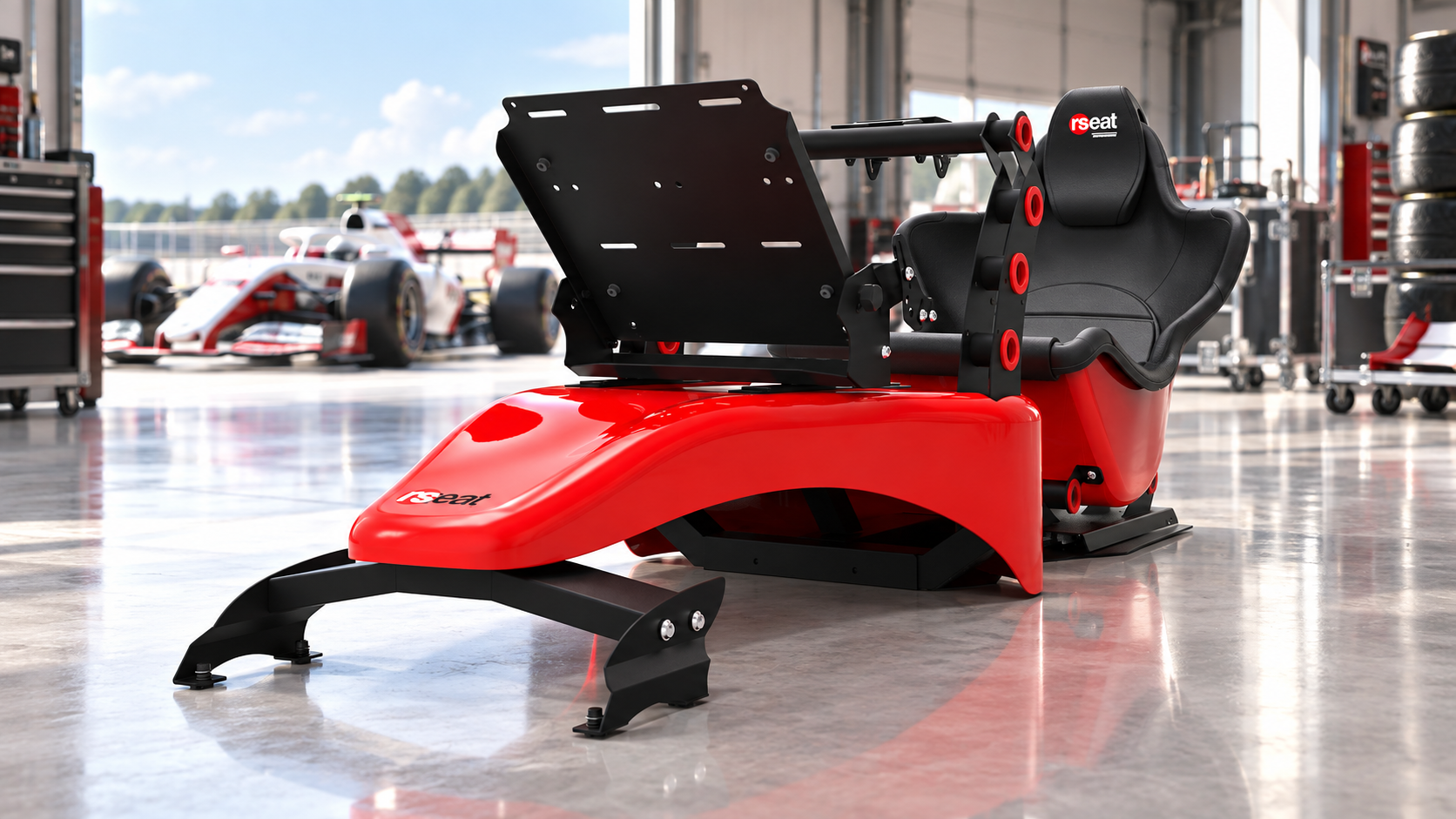 Red RSeat Formula V2 cockpit with its low seating position and raised pedal platform.
