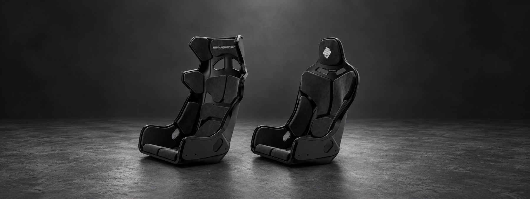 SIMGASM Atlas GT and Atlas Formula seats side by side, showing their different upper shell shapes and seating profiles