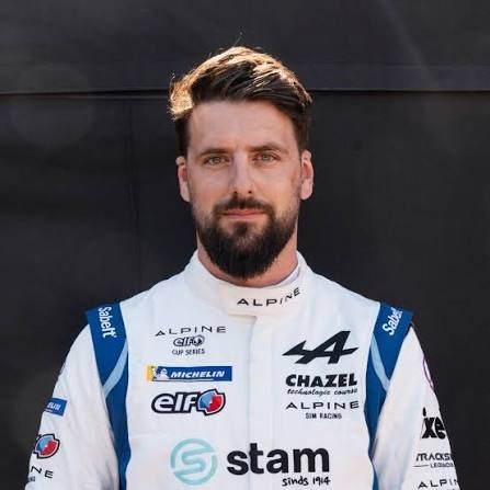 Johan Akkerman, founder, product designer and CEO of SIMGASM, wearing an Alpine Elf Cup racing suit.