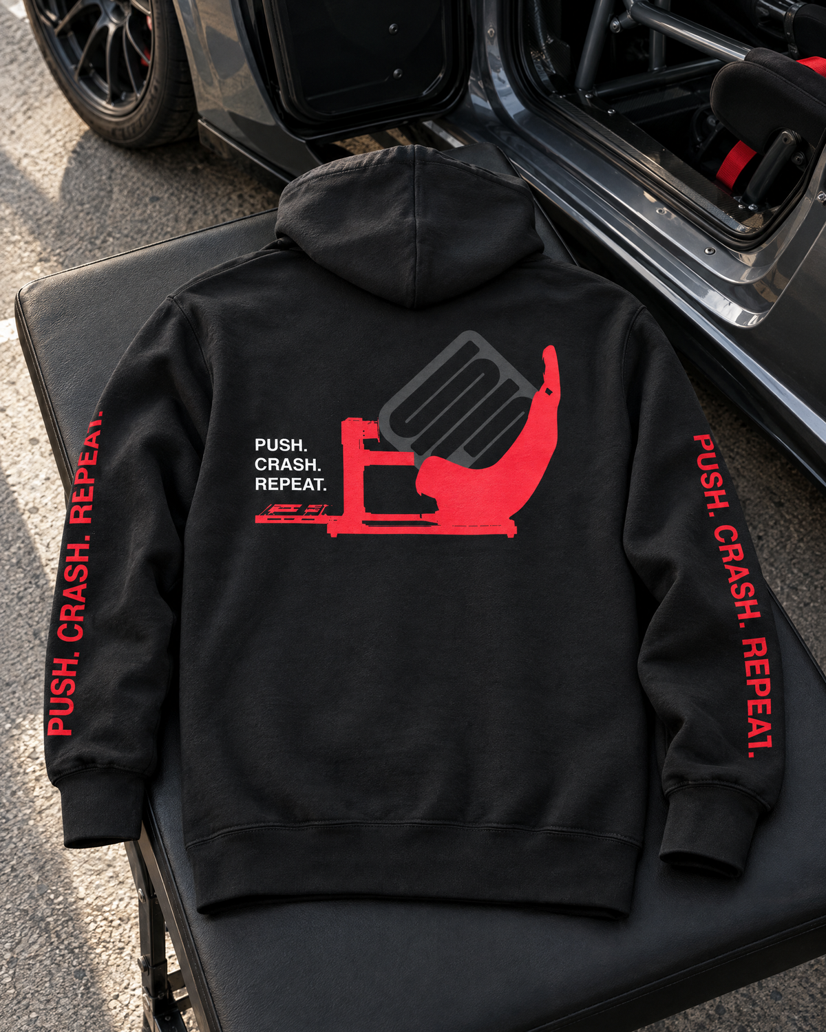 SIMGASM Push. Crash. Repeat. Hoodie - car and paddock setting
